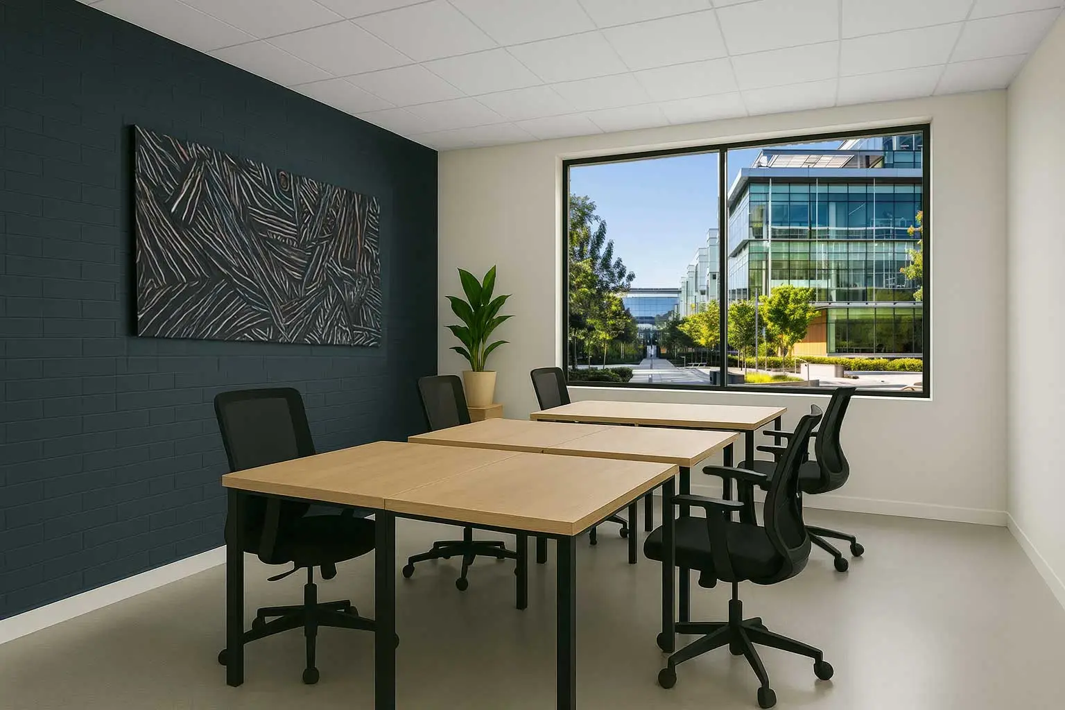 Team space with desks and window view