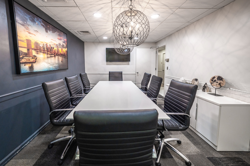 Modern conference room with artwork.