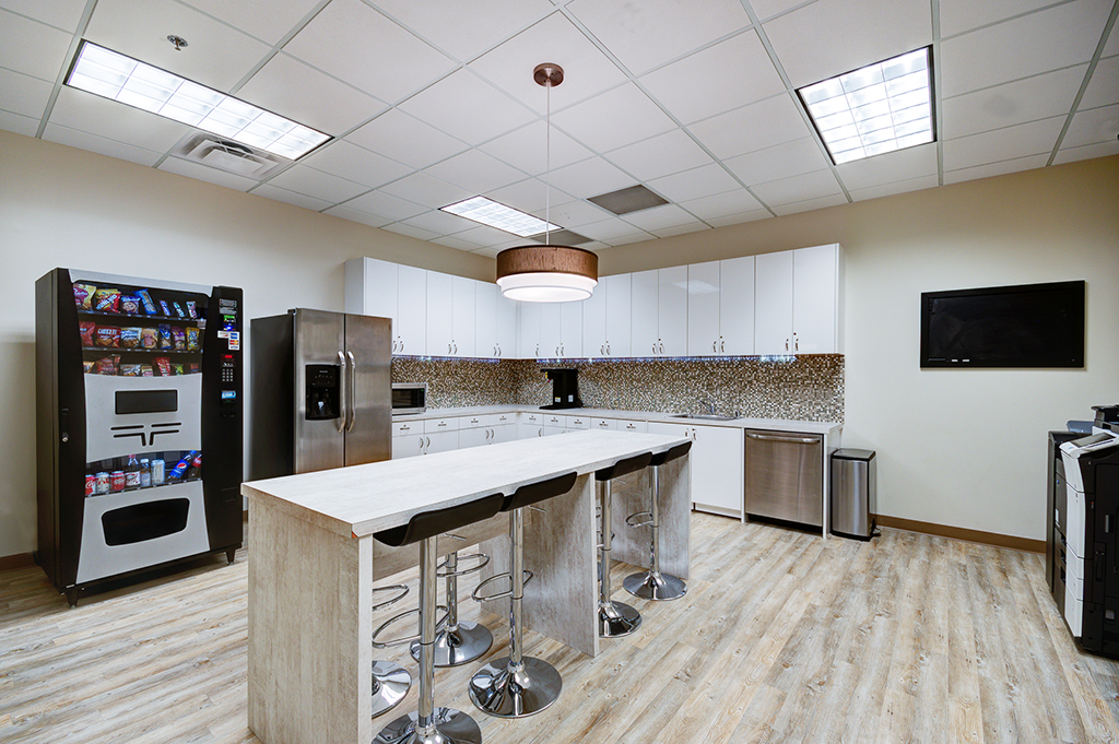 Modern kitchen area with table seating
