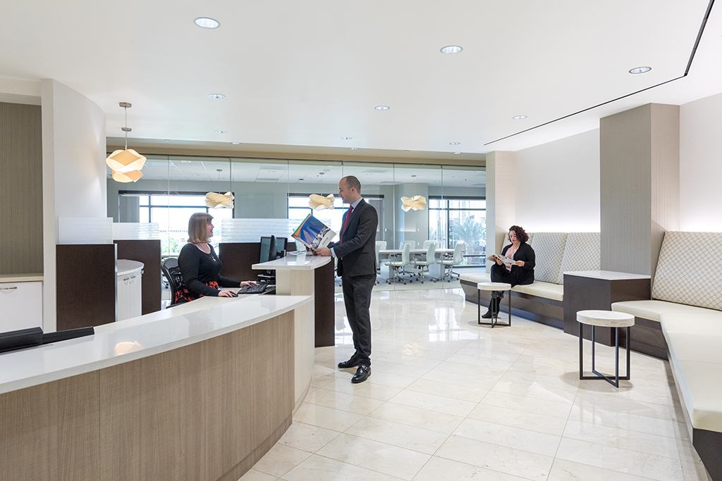 Modern reception area with seating.