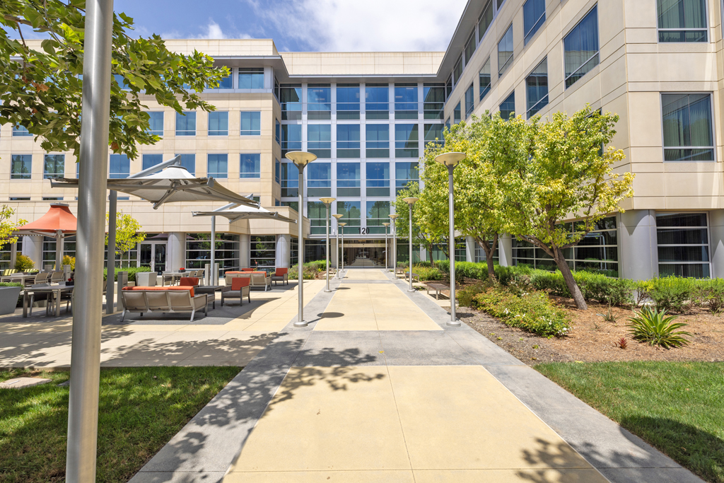 Modern building entrance with landscaping.