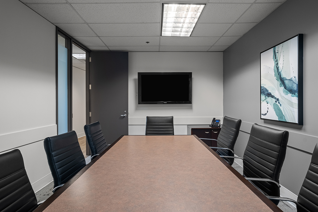 Modern conference room with dark furniture