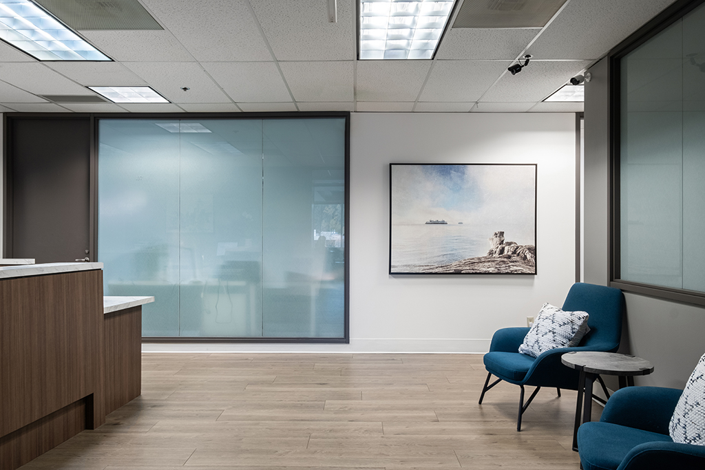 Modern office reception with artwork.