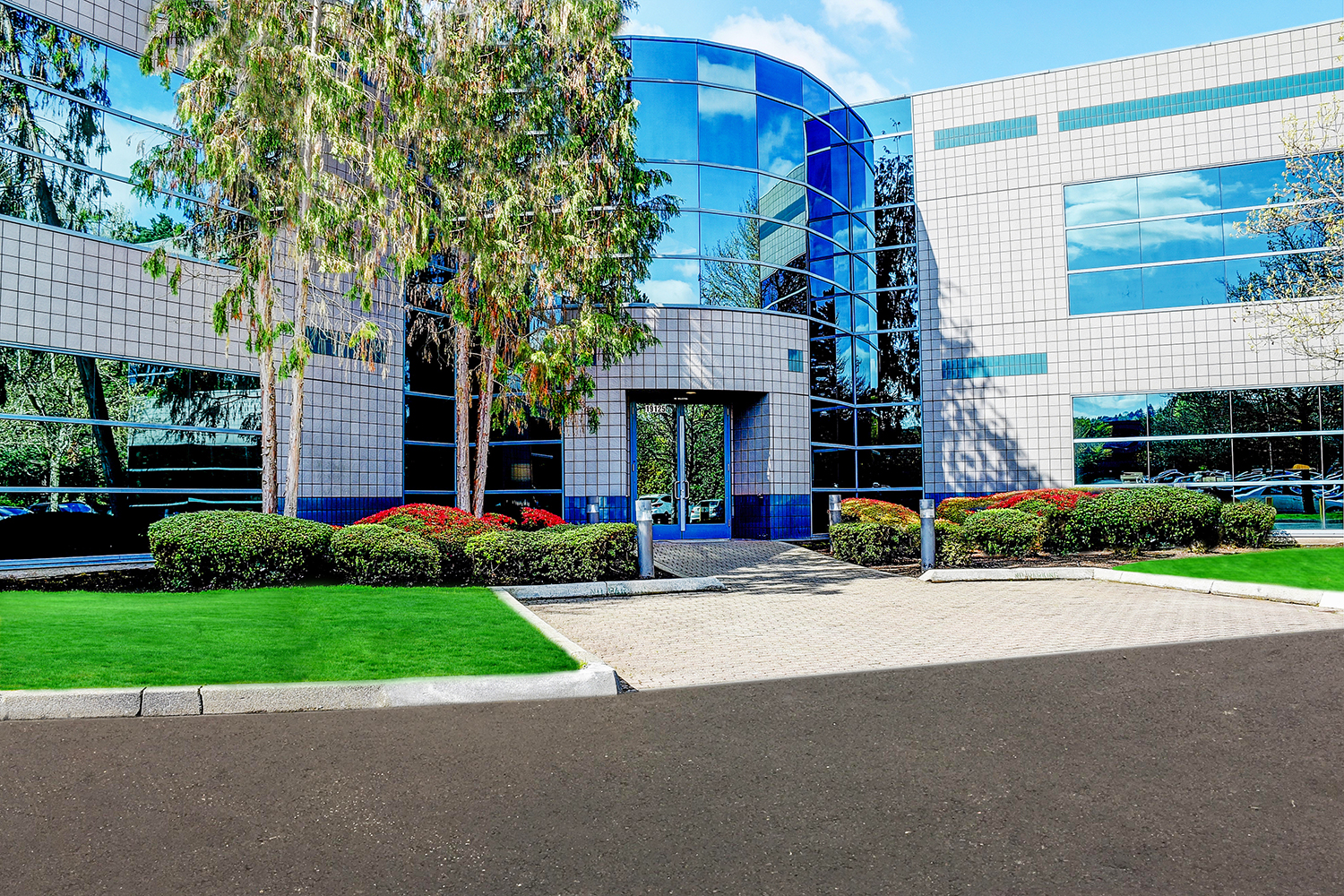 Modern office building with landscaped entrance