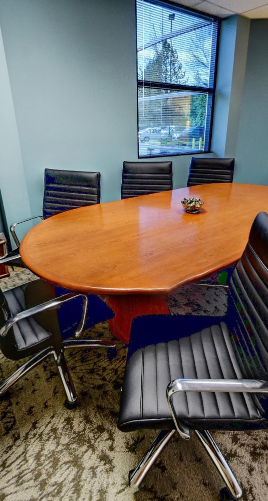Empty conference room with wooden table