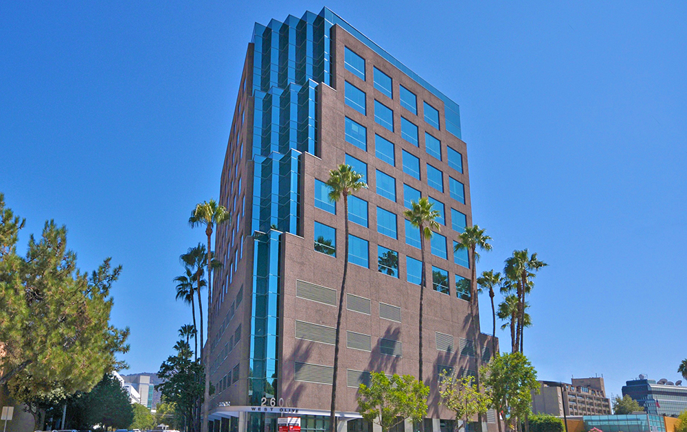 Modern building with palm trees