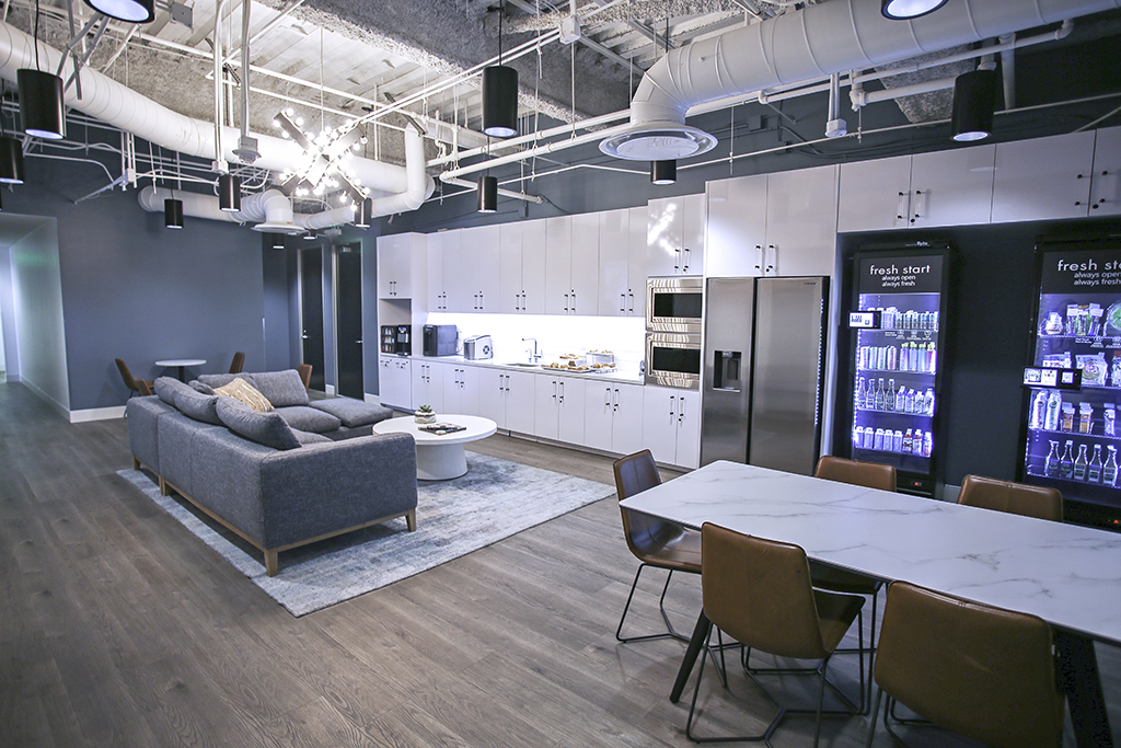 Modern kitchen with seating and appliances