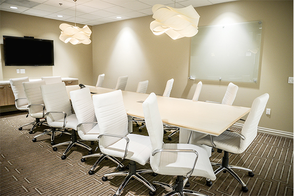 Modern conference room with white chairs