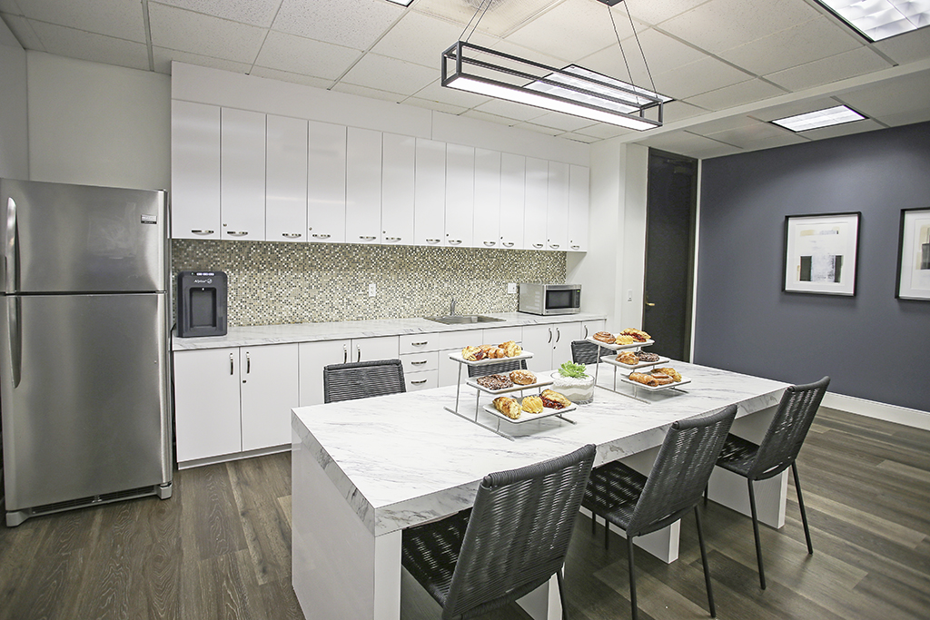 Modern kitchen with marble table.