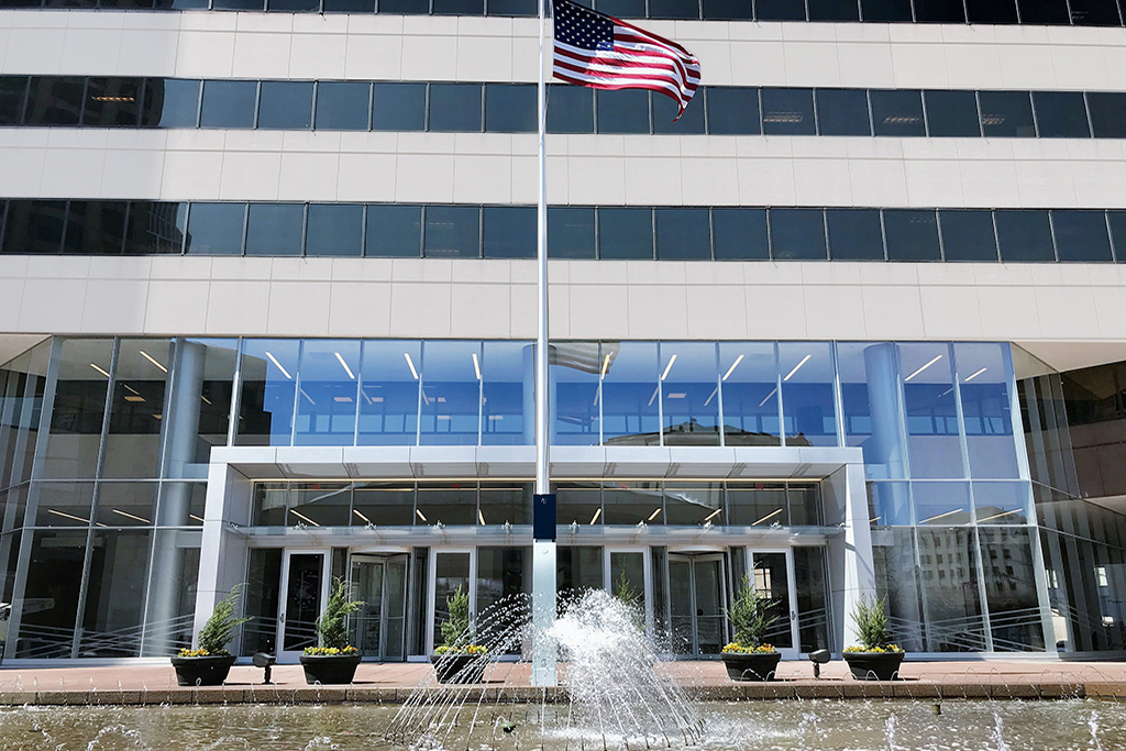 Modern building with American flag.