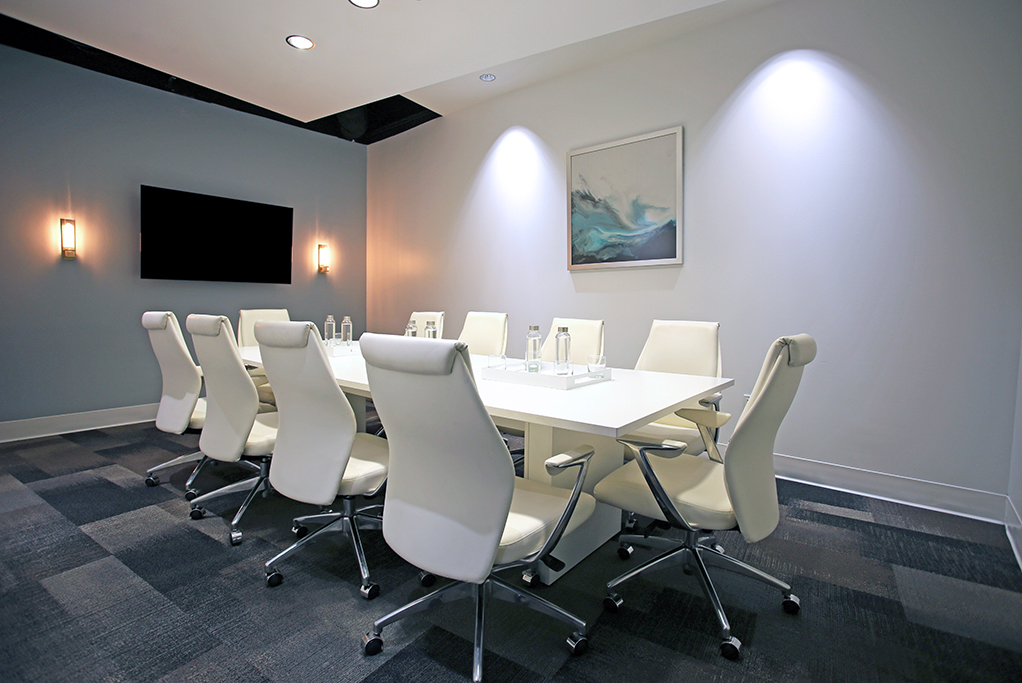Modern conference room with white chairs