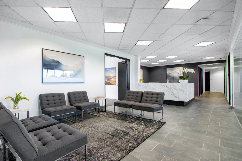 Modern office reception area with seating