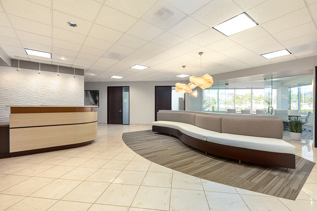 Modern reception area with seating.