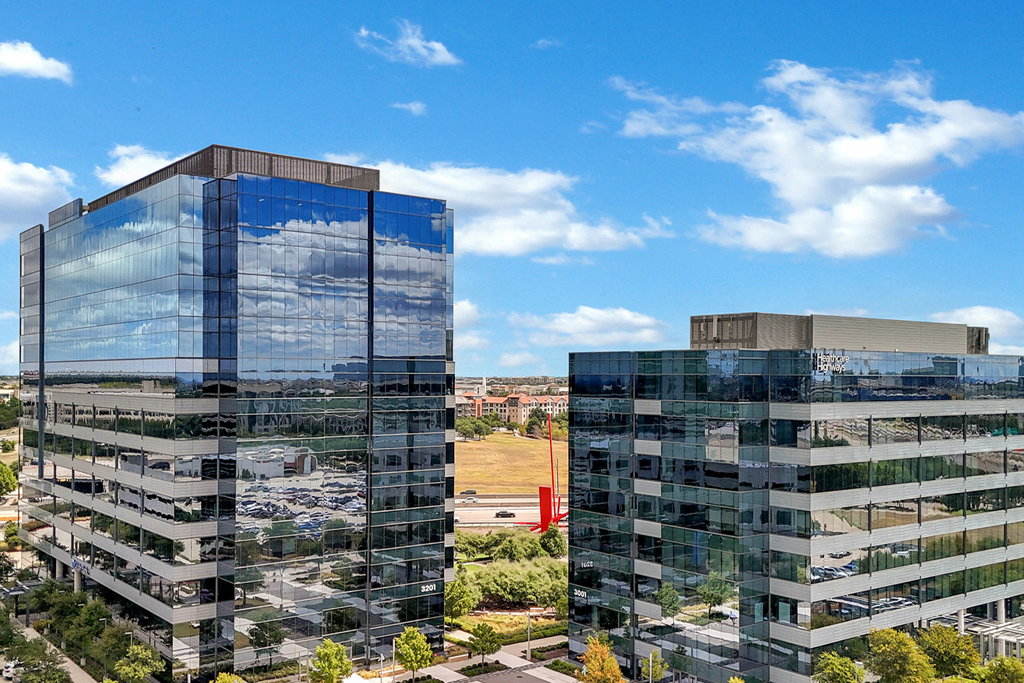 Modern glass office buildings under sky