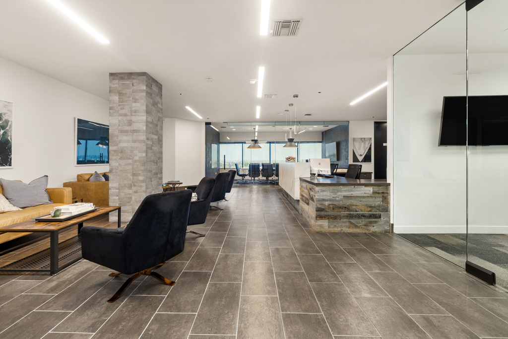 Modern reception area with seating.