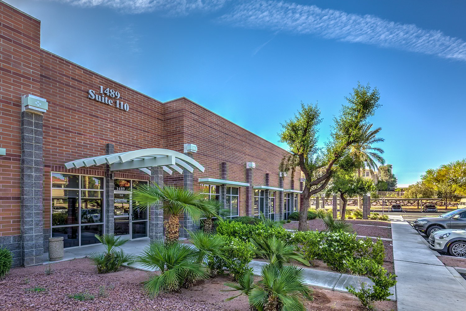 Modern office building with landscaping.