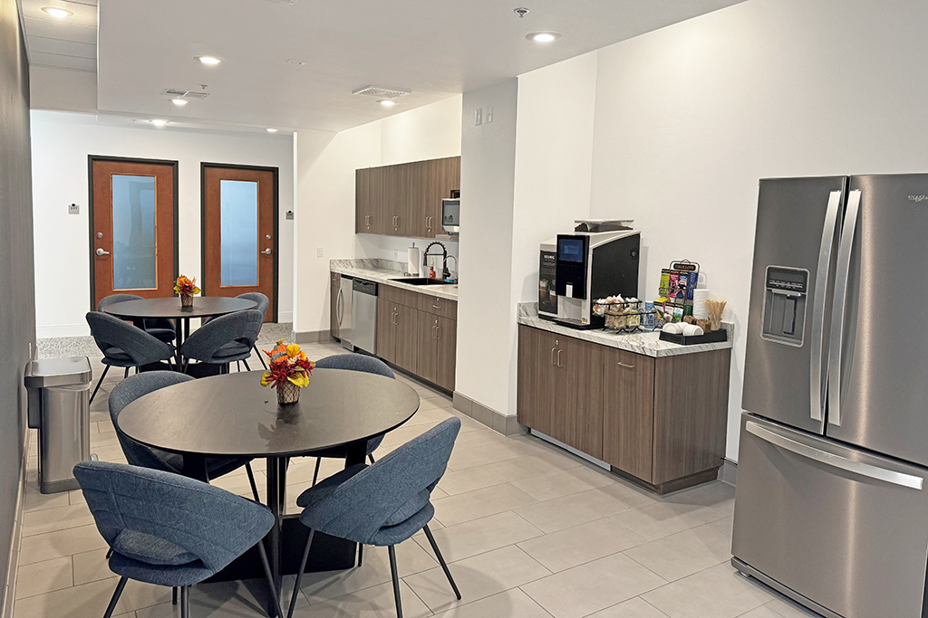 Modern kitchen with dining area.