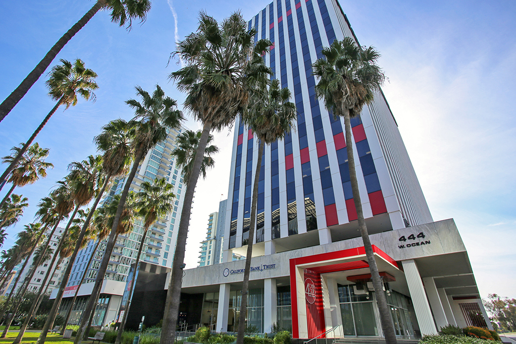 Modern building with palm trees