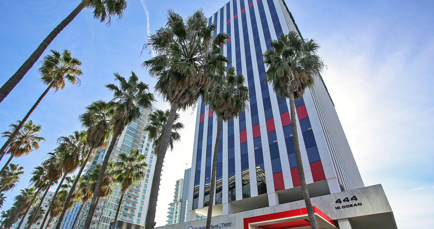 Modern building with palm trees