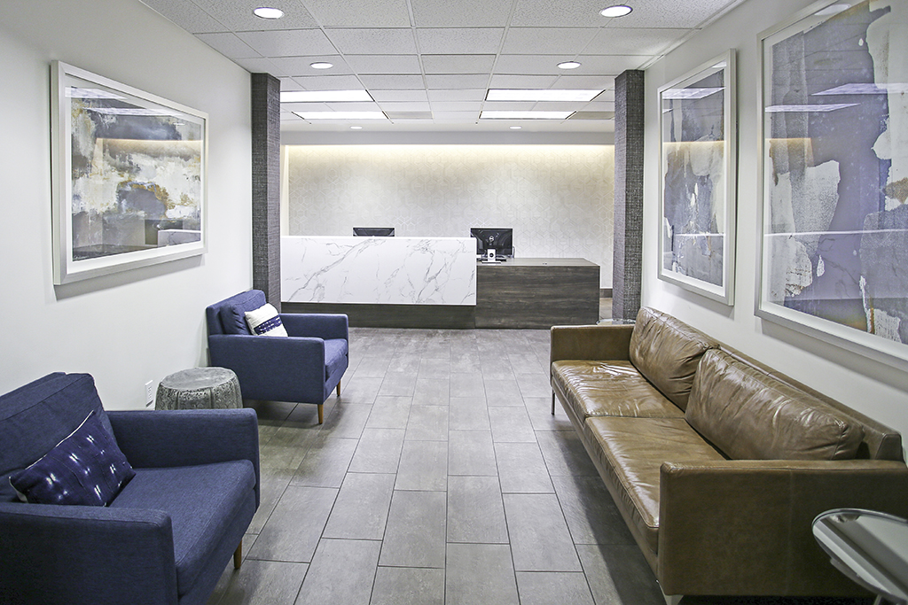 Modern reception area with seating.