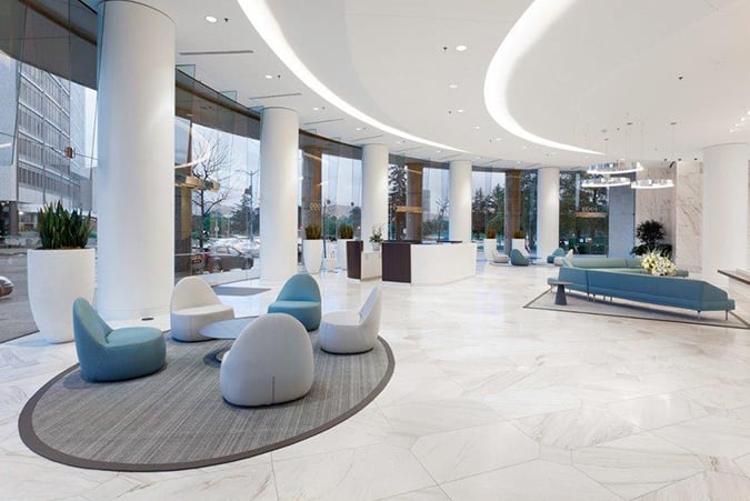 Modern, spacious, minimalist lobby design.