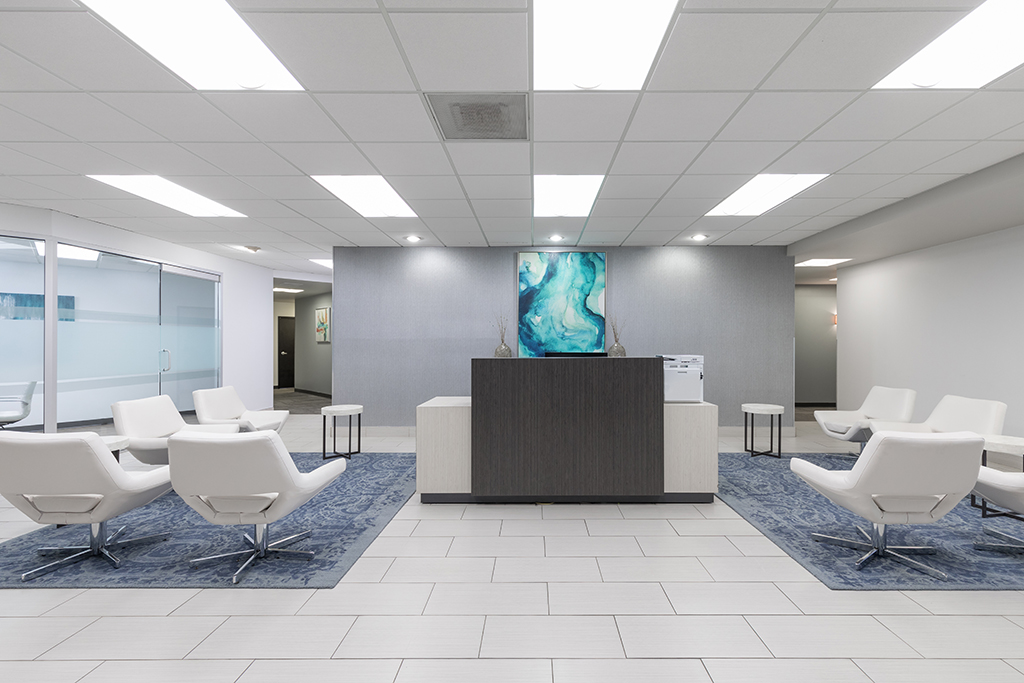 Modern reception area with seating.