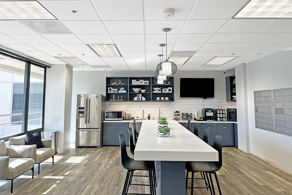 Modern kitchen with seating and appliances
