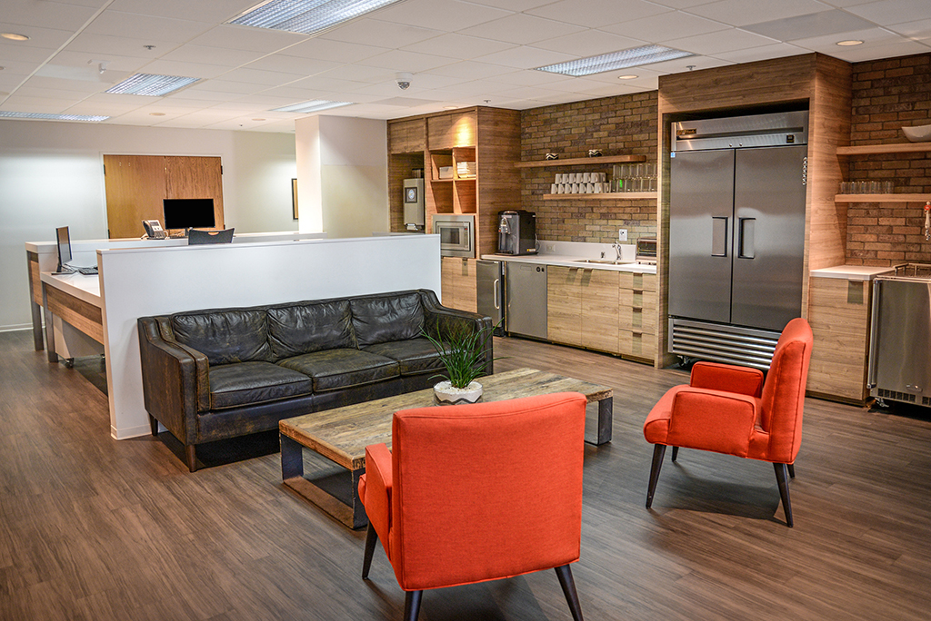 Modern kitchen with seating area.