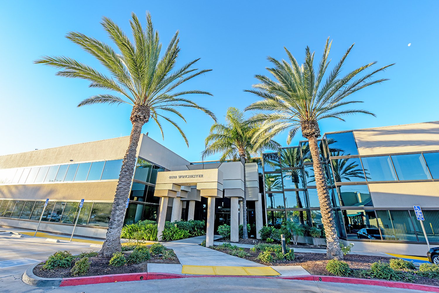 Building Front with palm trees