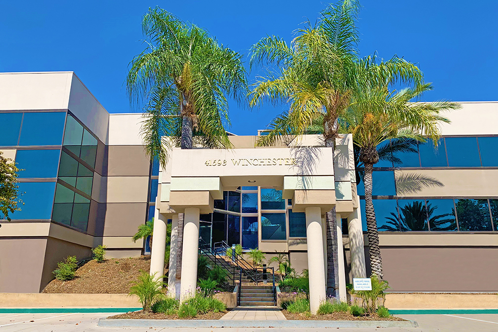 Modern building with palm trees