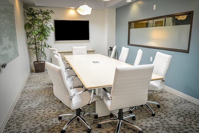 Modern conference room with white chairs