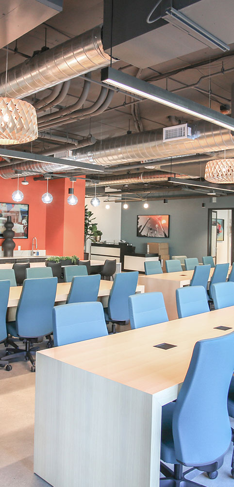 Modern coworking space with blue chairs