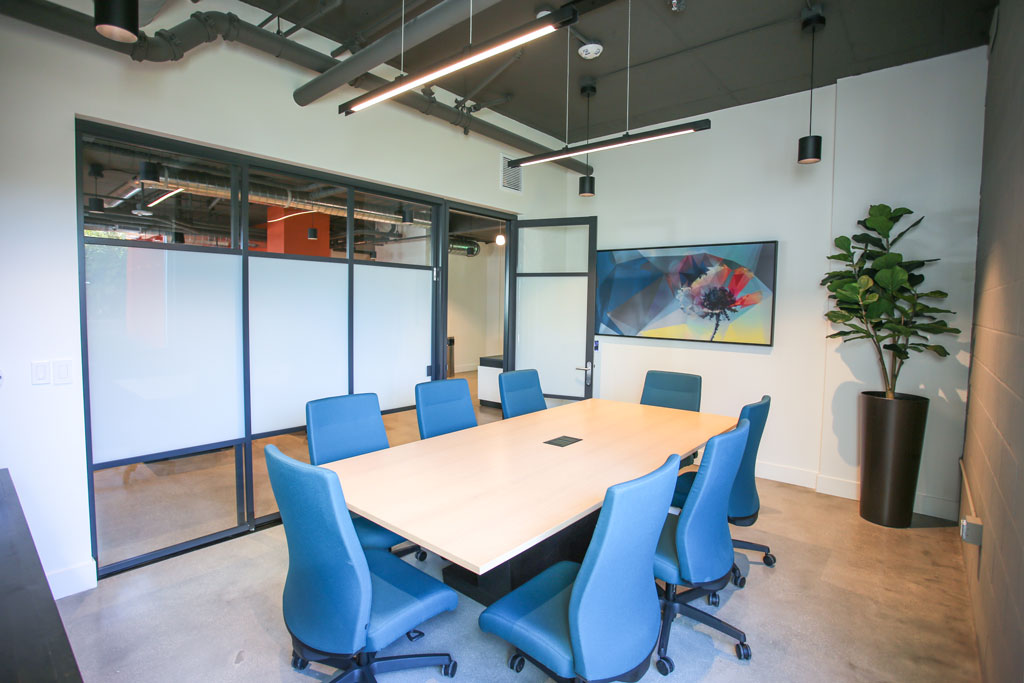 Modern conference room with blue chairs