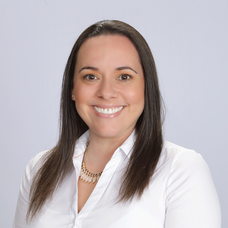 Woman in white shirt, long hair.