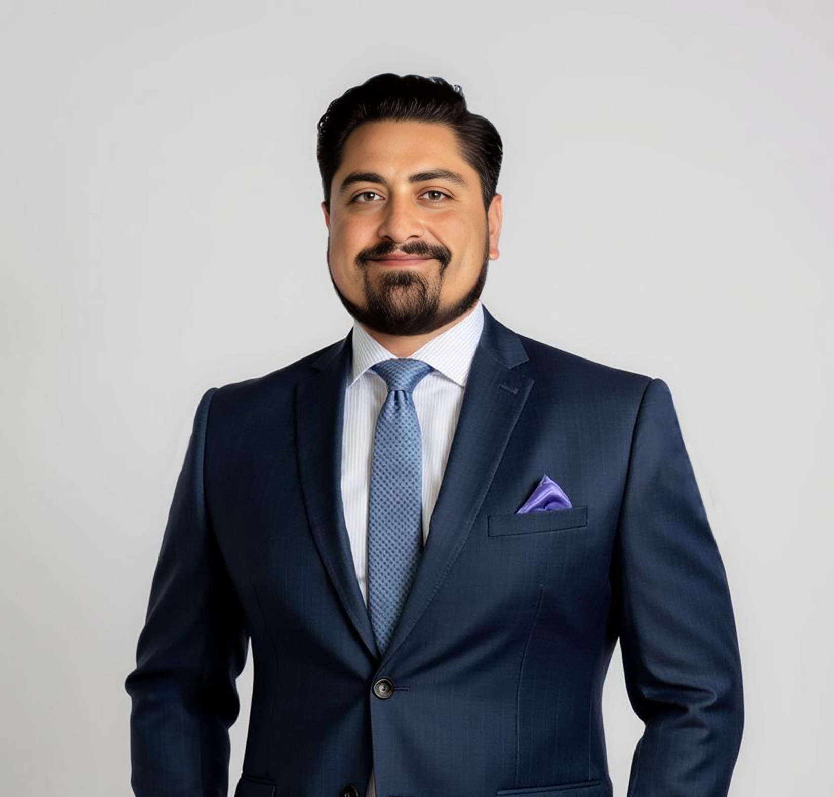 Man in formal suit and tie.