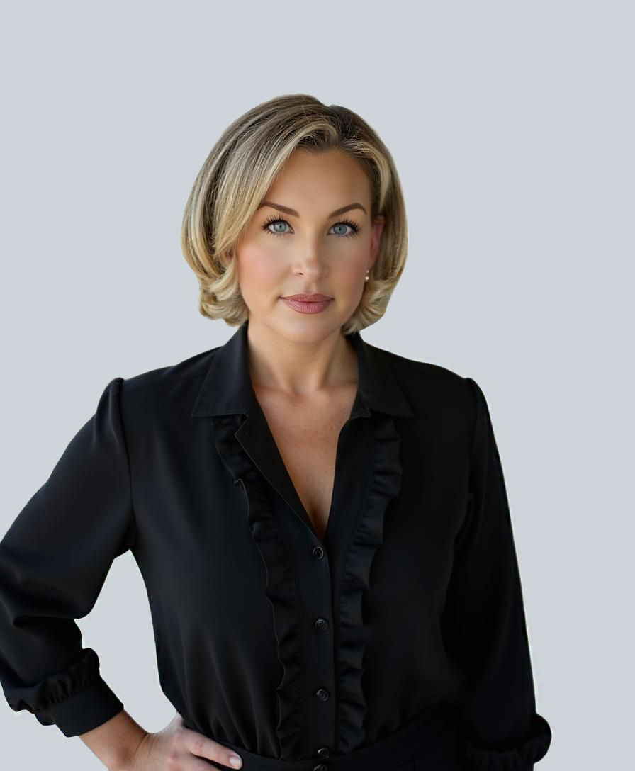 Woman in black blouse posing confidently.