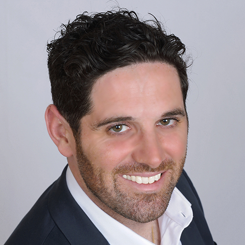 Man in professional black suit and white shirt